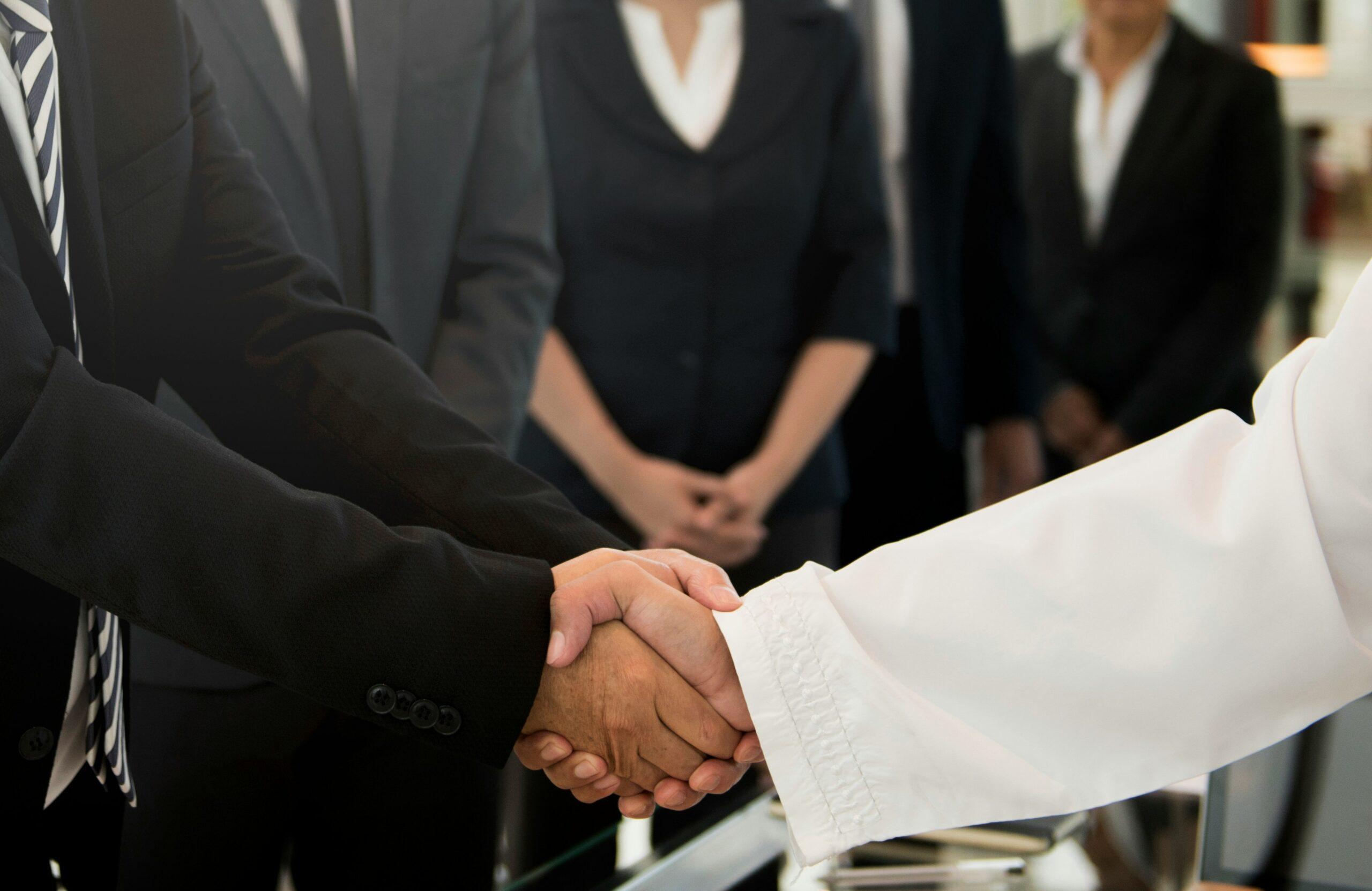 people doing a handshake